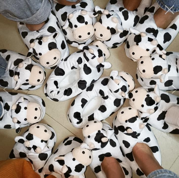 Cow slipper size L fits 9/10